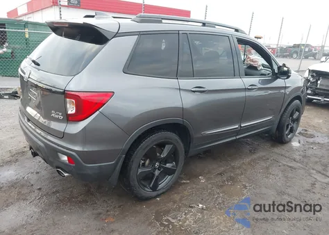 2019 Honda Passport Elite z USA, uszkodzony, nr VIN 5FNYF8H01KB006690